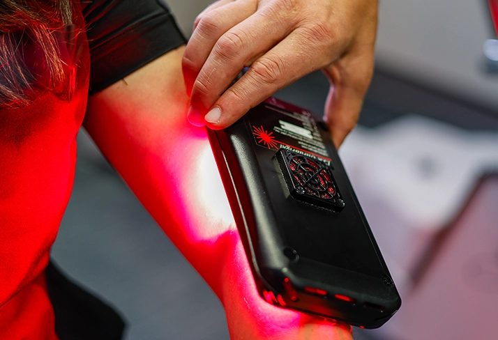 Red light on a patients arm.